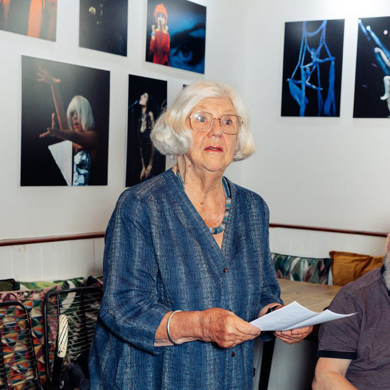 Photographer Ann Cook at the launch of her Glastonbury Years exhibition at The Pressoir in Wells, Somerset